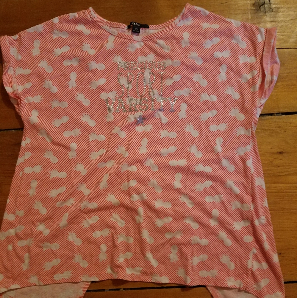 I am selling a shirt with pineapples all over it.
